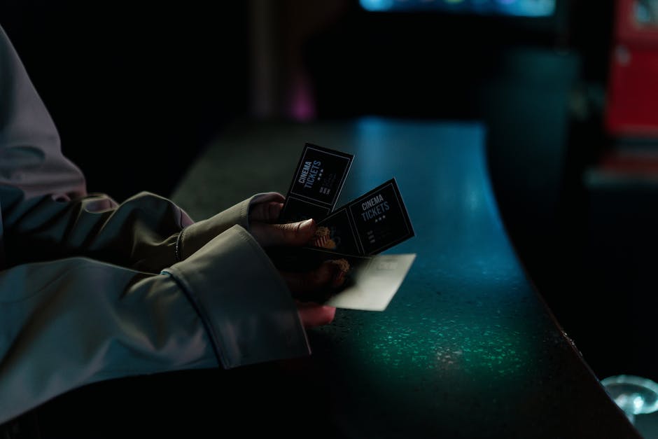 A person buying cinema tickets online