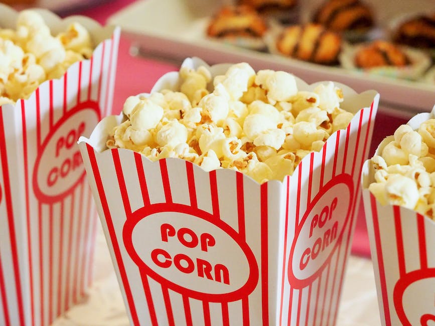 Illustration of various popcorn flavors representing emerging trends in cinema popcorn