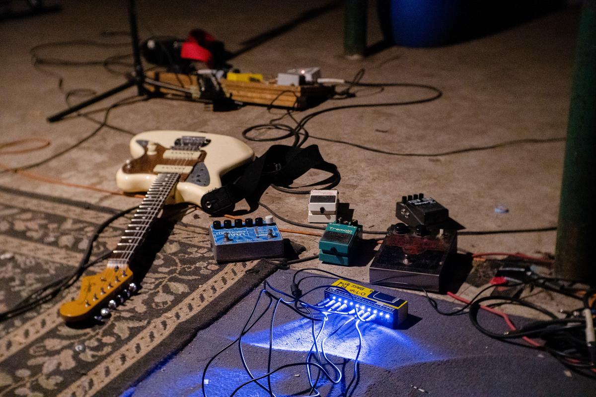 Image of different guitar features including the neck, body, pickup, and bridge.