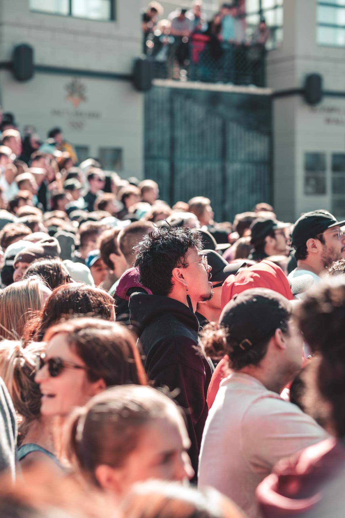 Illustration of a live music event with a crowd enjoying the performance.
